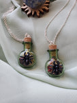 Spider bottle necklace