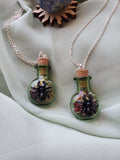 Spider bottle necklace