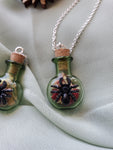 Spider bottle necklace