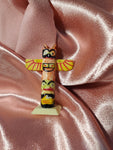 Mini totem pole trinket
