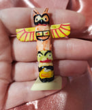 Mini totem pole trinket